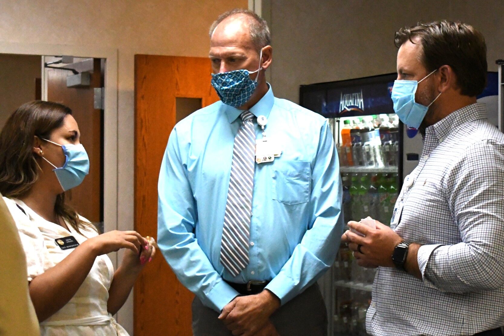 Rep. Yadira Caraveo, vice-chair health and insurance committee, with CFO Larry Vincent and CEO Matt Heyn